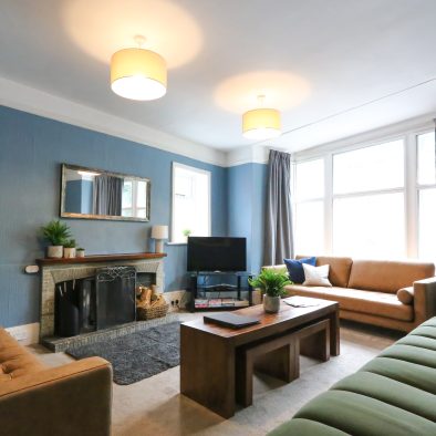 Dale House Kettlewell lounge with new couches, open fire and smart TV